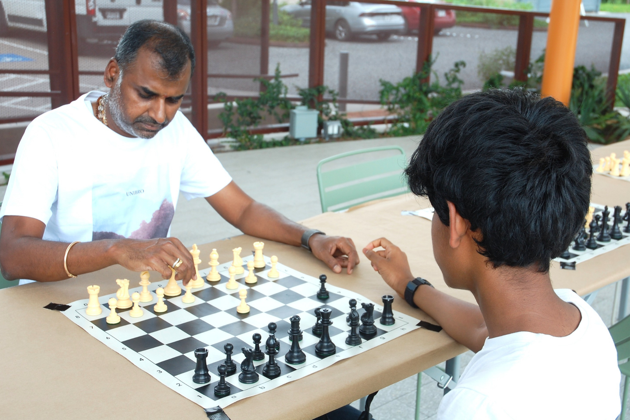 Two people playing chess